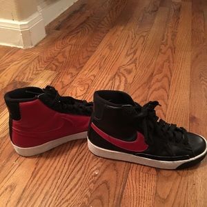 Red and Black Nike shoes